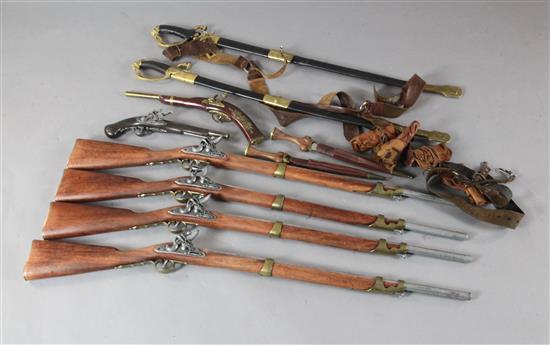 Four theatrical rifles, two pistols, two swords and two daggers
